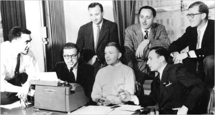 The legendary writing staff of Your Show of Shows in the 1950s included Mel Brooks (front row, far right) and Neil Simon (back row, far left). Their collaboration epitomizes 