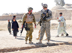 A U.S. and a British soldier in Kandahar province, Afghanistan on Nov. 16, 2010, during the Afghan holiday Eid-al-Qorbon, a celebration of forgiveness, friendship and peace.