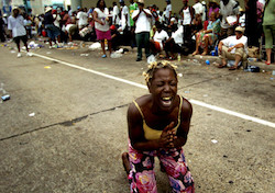 A woman begs for help in the wake of Hurricane Katrina