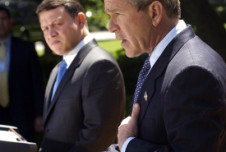 Jordan's King Abdullah II and President Bush in the White House Rose Garden discussing the abuses at Abu Ghraib prison with the media on May 6, 2004. 