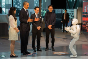 Barack Obama watches Asimo, a robot made by Honda 
 (State Department photo by William Ng / public domain).