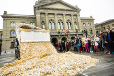 Swiss proponents of basic income dump 8 million coins in a public square, one for each Swiss resident.  