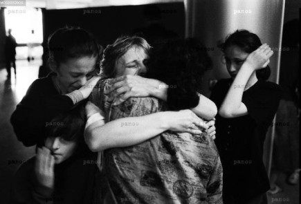 Women and children are reunited with their families after being imprisoned by Serb authorities during the Bosnian civil war