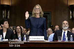 Dr. Christine Blasey Ford is sworn in to testify in the confirmation hearings of Supreme Court nominee Brett Kavanaugh.