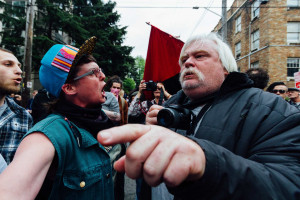 Protestors argue at an anti-capitalism protest in Seattle in 2015.