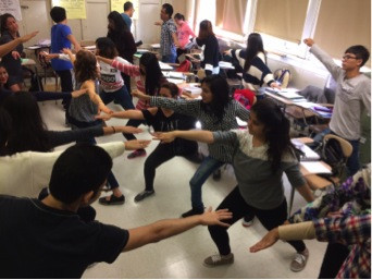 Students practicing yoga