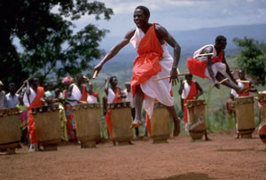 Gitaga drummers and dancers perform in Burundi. Throughout history, artistic ceremonies such as this one have fostered social bonding.