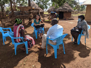 Stanford researcher Christine Pu interviews residents of rural Uganda to understand local perceptions and definitions of poverty.