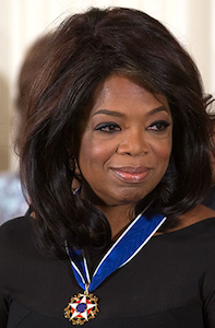 Oprah receiving the 2013 Presidential Medal of Freedom