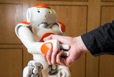 You Should Always Shake Hands with a Robot