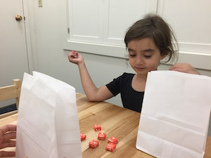 Matilda thinks about how many Starburst she’s willing to part with in a study from Boston and Yale Universities exploring how gratitude affects children’s sharing.