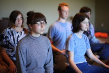 Students meditating at an iBme mindfulness retreat