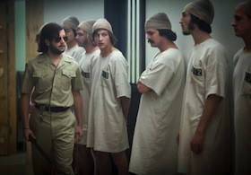 A scene from the 2015 film, <a href=“https://www.youtube.com/watch?v=3XN2X72jrFk”>Stanford Prison Experiment</a>.