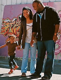 Author and activist Shawn Taylor with his wife and child