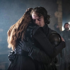 Sansa hugs Theon in <em>Game of Thrones</em>.