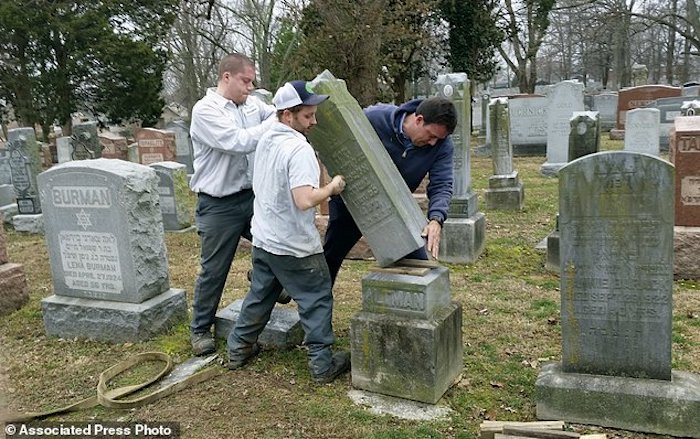 Workers repair St. Louis cemetery