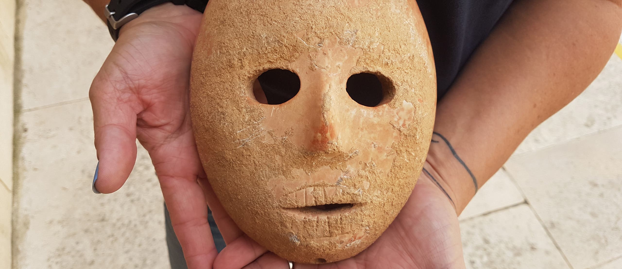 The 9,000-year-old mask found in the Hebron hills by a settler going for a walk. Credit: Antiquities Theft Prevention Unit, Israel Antiquities Authority